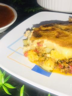 Una foto de Gratinado patata y carne picada 🍲