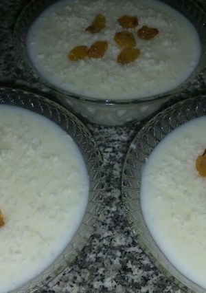 A picture of Rice Pudding with Whipped Cream Powder.