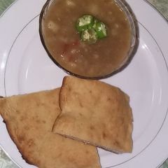 Spicy potato soup with homemade bread A picture of Spicy potato soup with homemade bread.