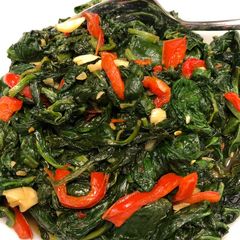 A picture of Garlicky Spinach with Red Peppers.
