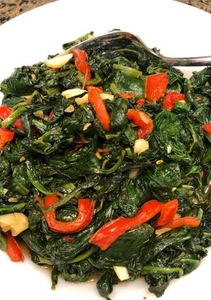 A picture of Garlicky Spinach with Red Peppers.