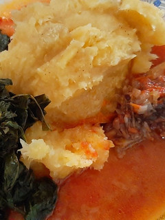 A picture of Chicken stew with mashed bananas.