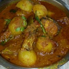 A picture of Rohu fish curry.