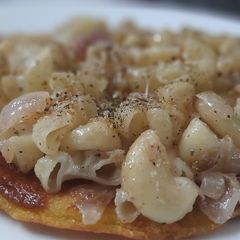 A picture of Cheela Macaroni Pizza.