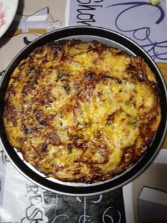 Una foto de Pizza de fiambre de pollo adobado casero