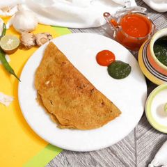 Masala Green Moong Dal Chilas A picture of Masala Green Moong Dal Chilas.
