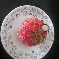 A picture of Coloured sugar sprinkle for cakes cup cakes decoration.