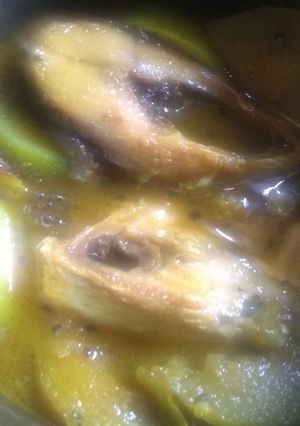 A picture of Hilsha & vegetables curry.