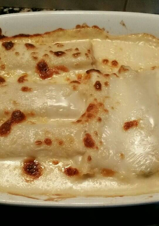Una foto de Canelones rellenos de paella