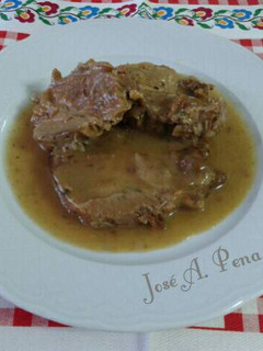 Una foto de Cabeza de lomo de cerdo en salsa