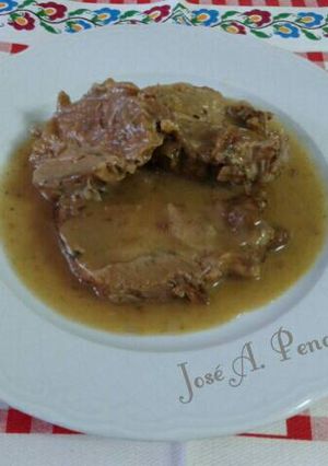 Foto principal de Cabeza de lomo de cerdo en salsa