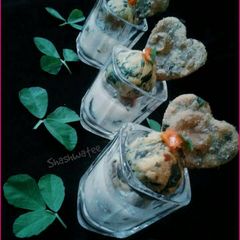 A picture of Methi kadhi and poori shots.