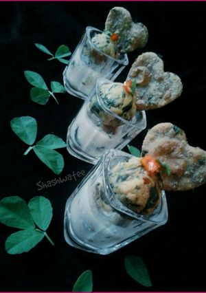A picture of Methi kadhi and poori shots.