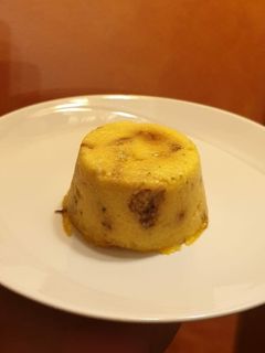 Foto di Tortini di polenta con funghi e cuore morbido di taleggio