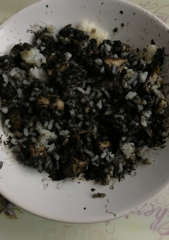 Una foto de Calamares en su tinta