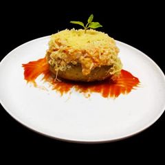A picture of Steamed and baked stuff potatoes.