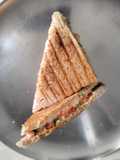 Cheese, vegetable and mayonnaise grilled sandwich