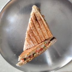 Cheese, vegetable and mayonnaise grilled sandwich A picture of Cheese, vegetable and mayonnaise grilled sandwich.