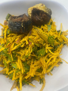 A picture of Abacha and fried fish.