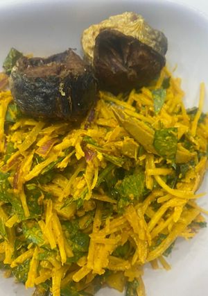 A picture of Abacha and fried fish.