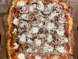 Pizza con base de patata en horno