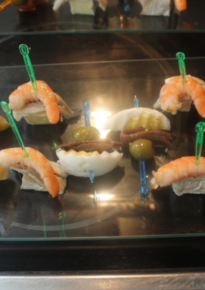 Una foto de Aperitivos variados con marisco