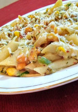 A picture of Vegtable white sauce pasta.