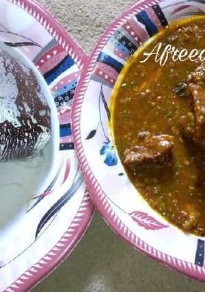A picture of Amala and okro soup.