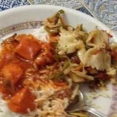 A picture of Chicken Manchurian n pasta with rice.