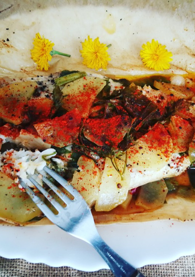 Una foto de Merlucita con verduras en papillote