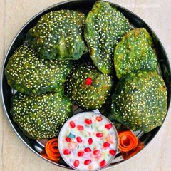 Palak Puri or Deep fried Spinach flat bread A picture of Palak Puri or Deep fried Spinach flat bread.