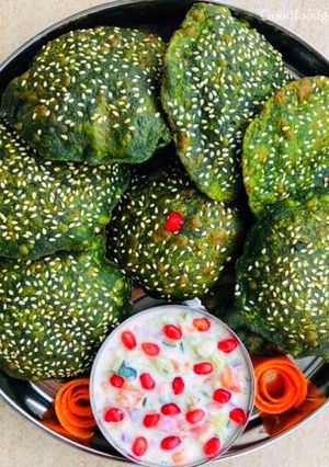 A picture of Palak Puri or Deep fried Spinach flat bread.