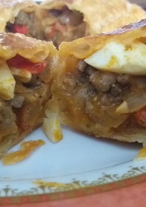 Una foto de Empanadas de carne cortada a cuchillo