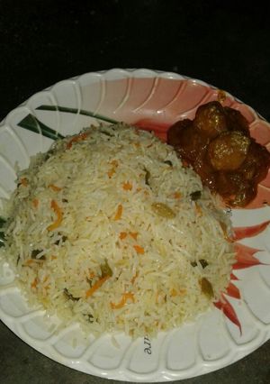 A picture of Dum aloo and mix veg pulav.