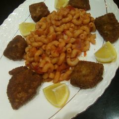 A picture of Pasta and fish fillet.