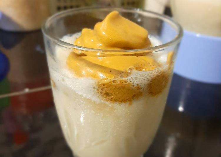 Banana smoothie with dalgona coffee topping