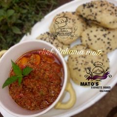 A picture of Mince meat carrot sauce serve with Homemade Gurasa.