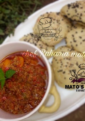 A picture of Mince meat carrot sauce serve with Homemade Gurasa.