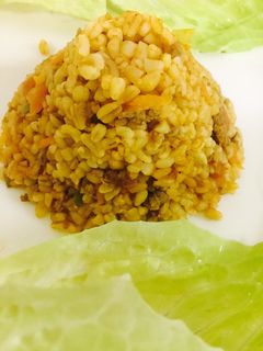 صورة لوصفة برغل بندورة بطعمة البرياني والكبسة