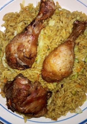 A picture of Fried Rice and chicken.