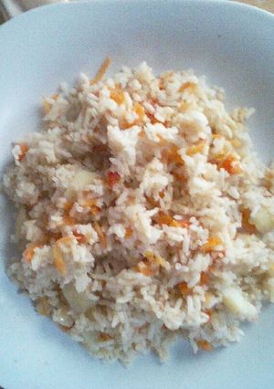 A picture of Rice and carrots.