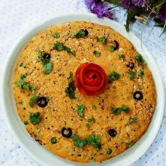 A picture of Veg Olive Semolina Savoury Cake.