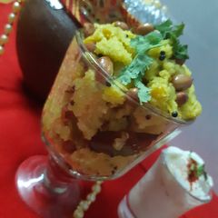 A picture of Upma with dahi handi.