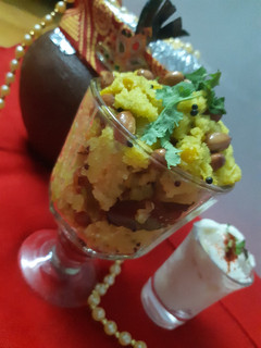 A picture of Upma with dahi handi.