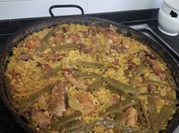 A picture of chicken and lima beans
