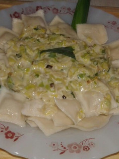 Una foto de Ravioles de ricota con Salsa de Puerro