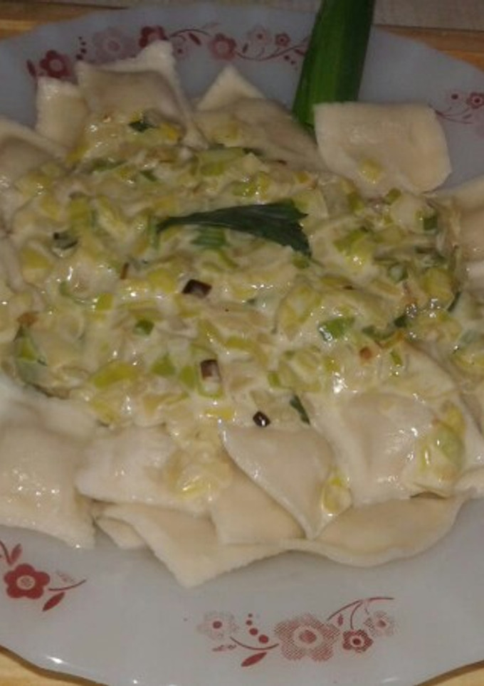 Una foto de Ravioles de ricota con Salsa de Puerro