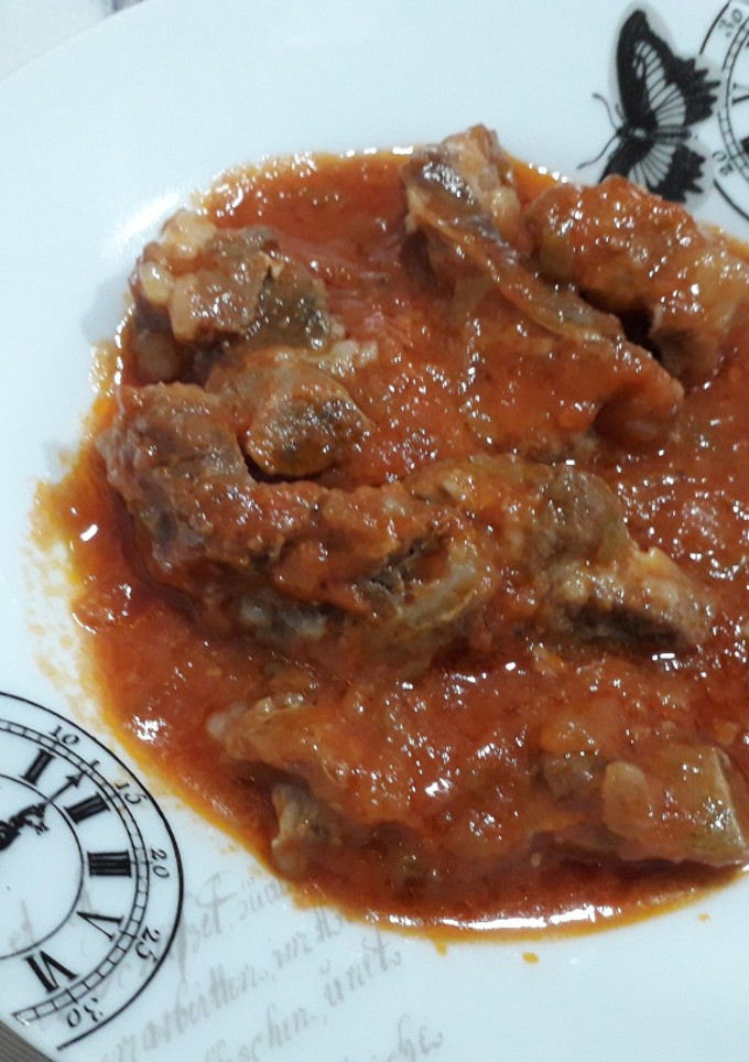 Una foto de Costillas de cerdo con tomate
