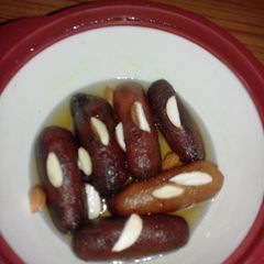 Sweet potato with kesar gulab jamun A picture of Sweet potato with kesar gulab jamun.