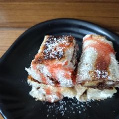 A picture of Nuetella and banana french toast roll ups.